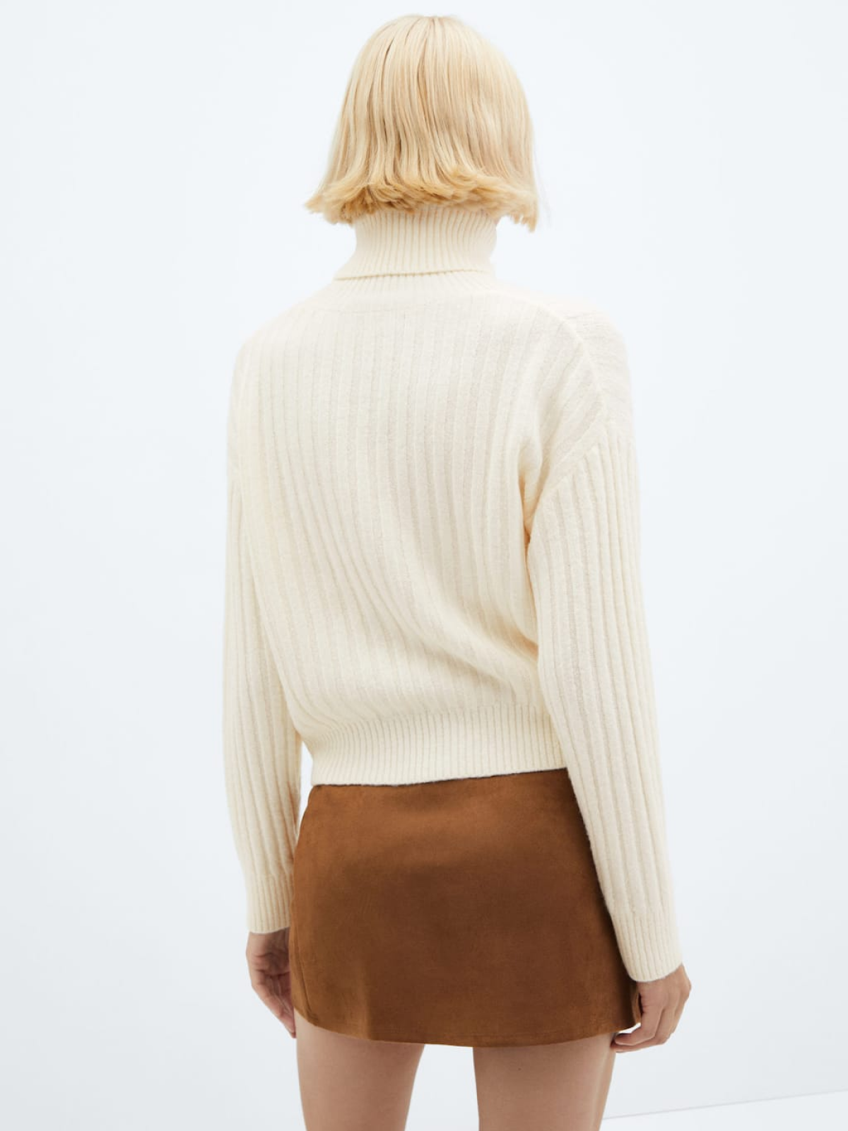 Rolled neck cable sweater